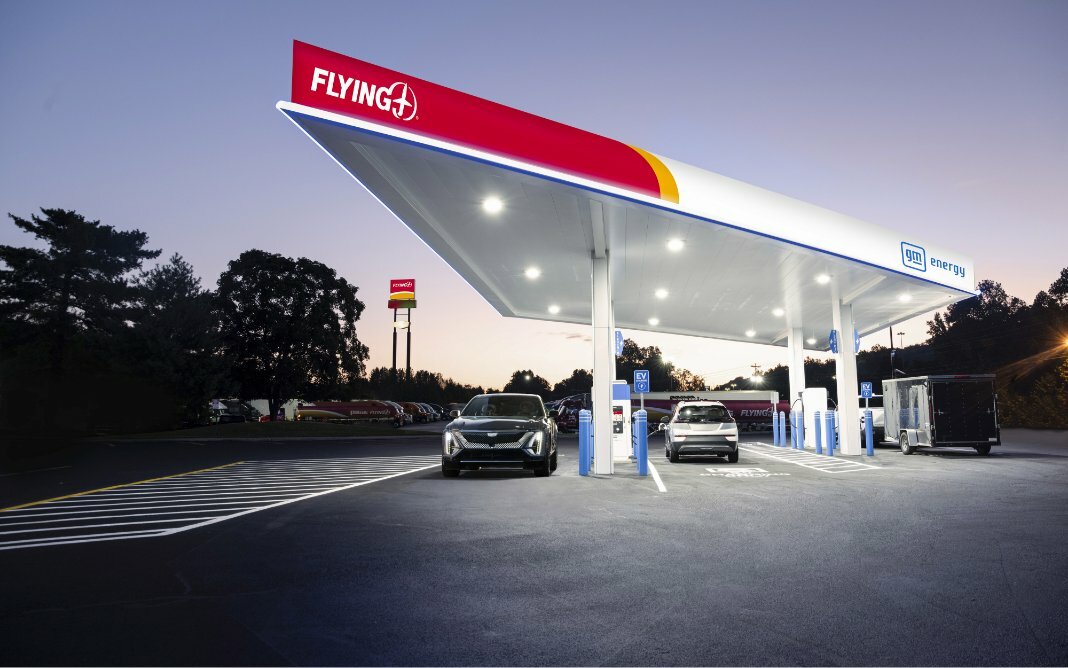 Two Vehicles Parked in Front of a Pilot Convenience Store