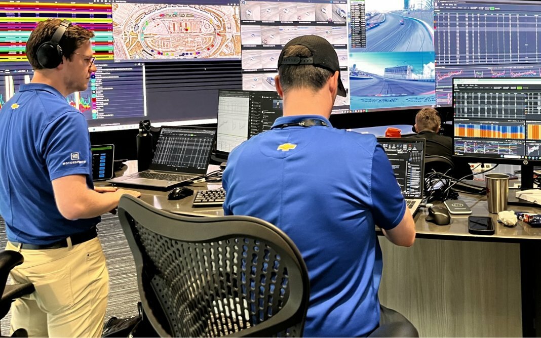 Two Motorsport Engineers Reviewing Vehicle Data