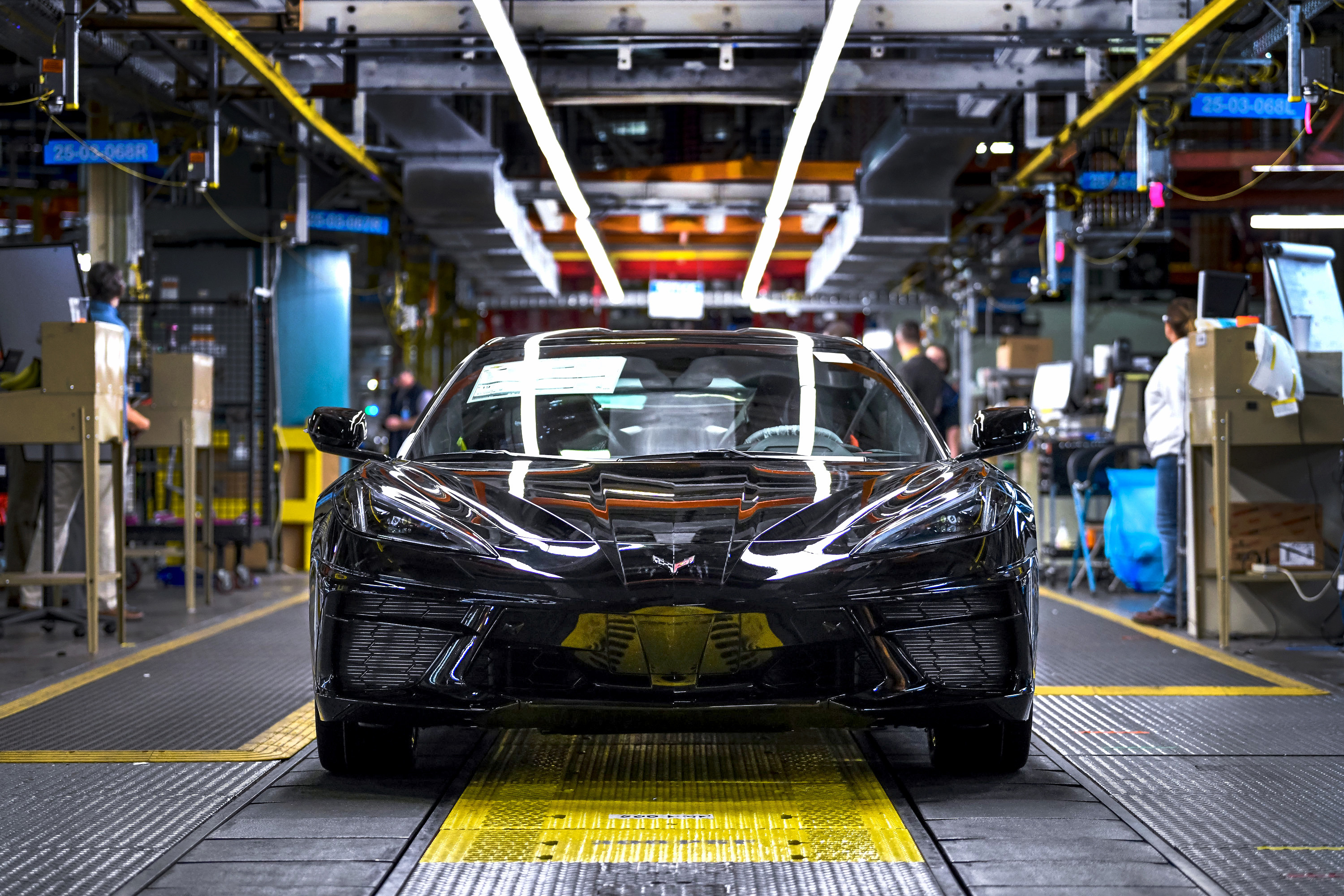 Completed black Corvette rolls off assembly line