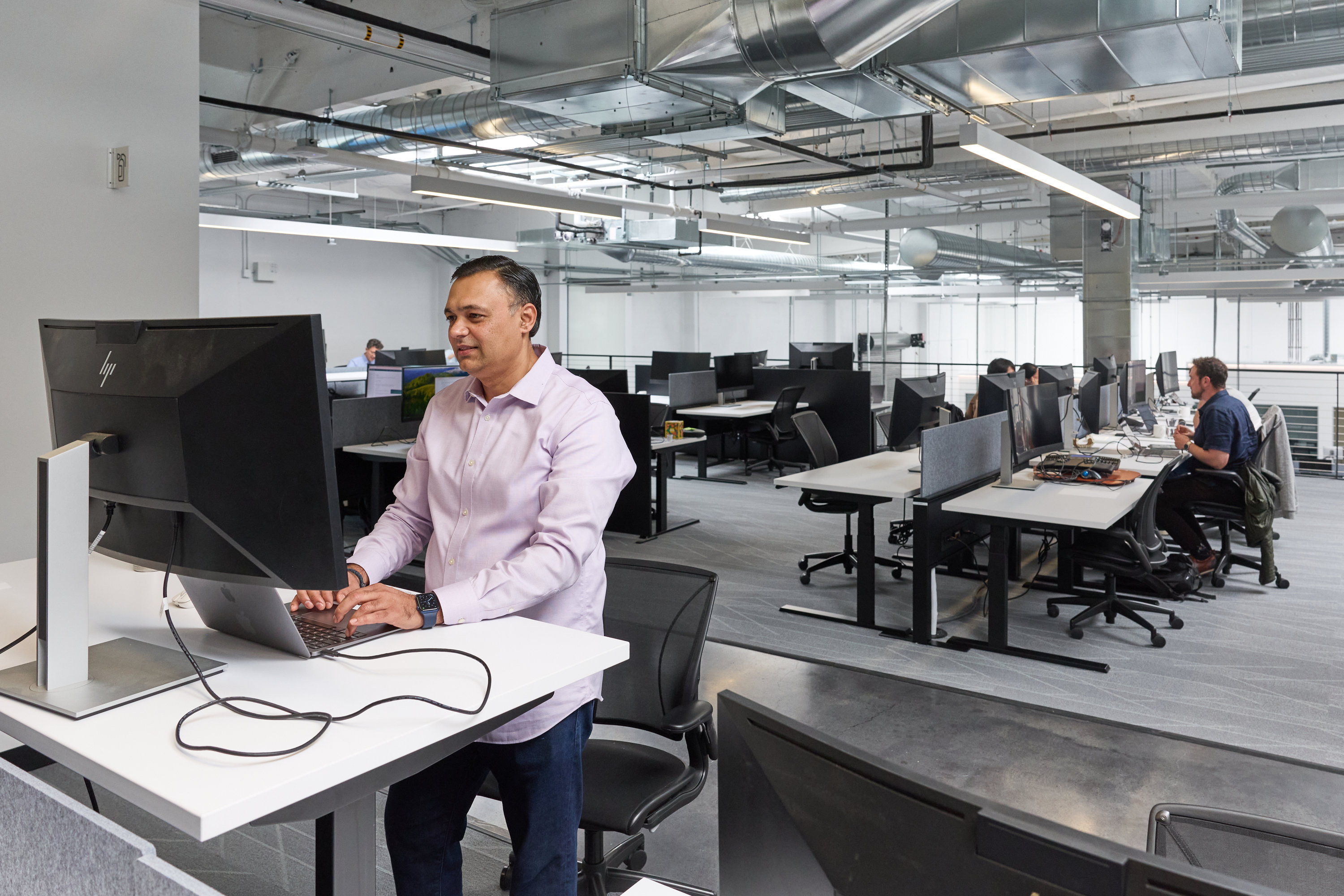 Team members working at General Motors’ Mountain View Tech Center.
