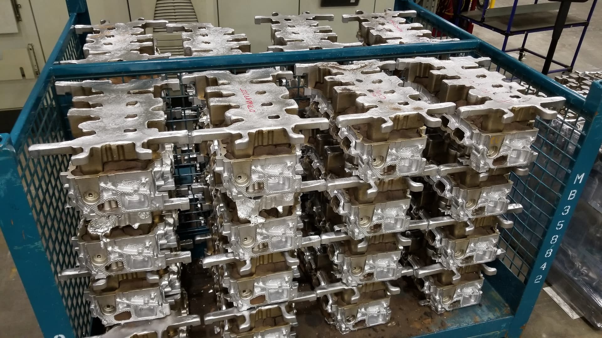 Pallet stacked full of engine cylinder heads