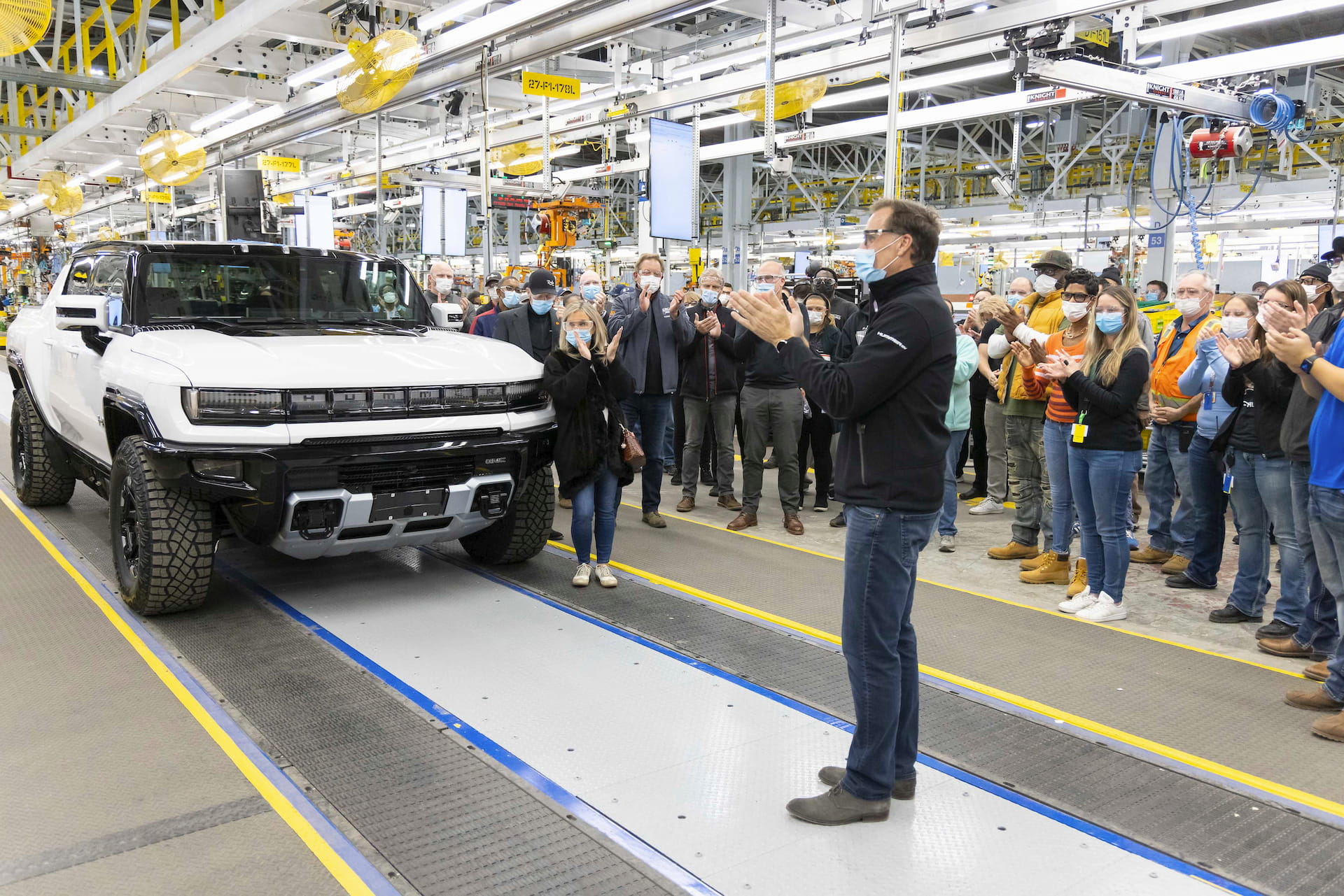 Crowd cheers as first completed Hummer EV rolls off assembly line