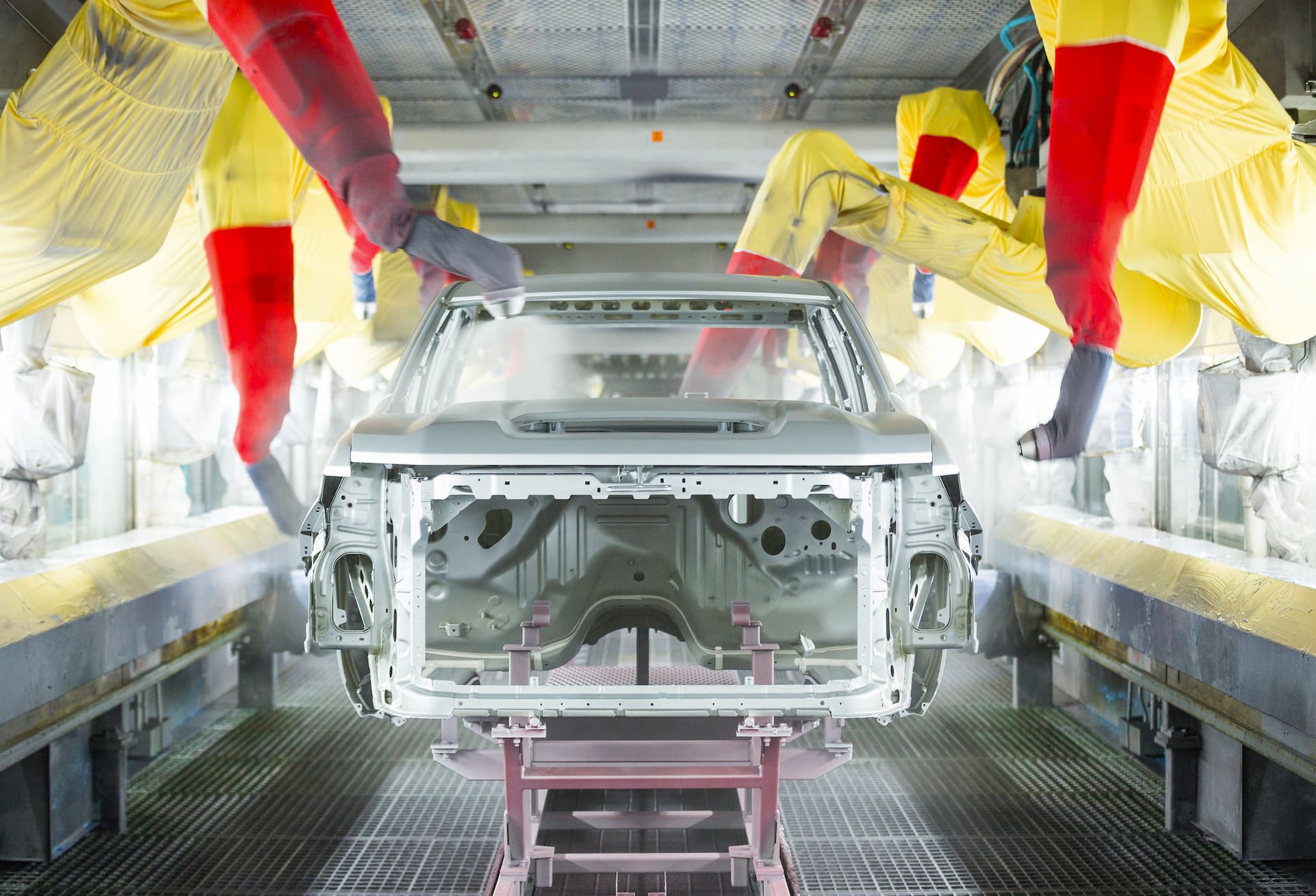 A silver 2020 Chevrolet Silverado HD body in the paint shop