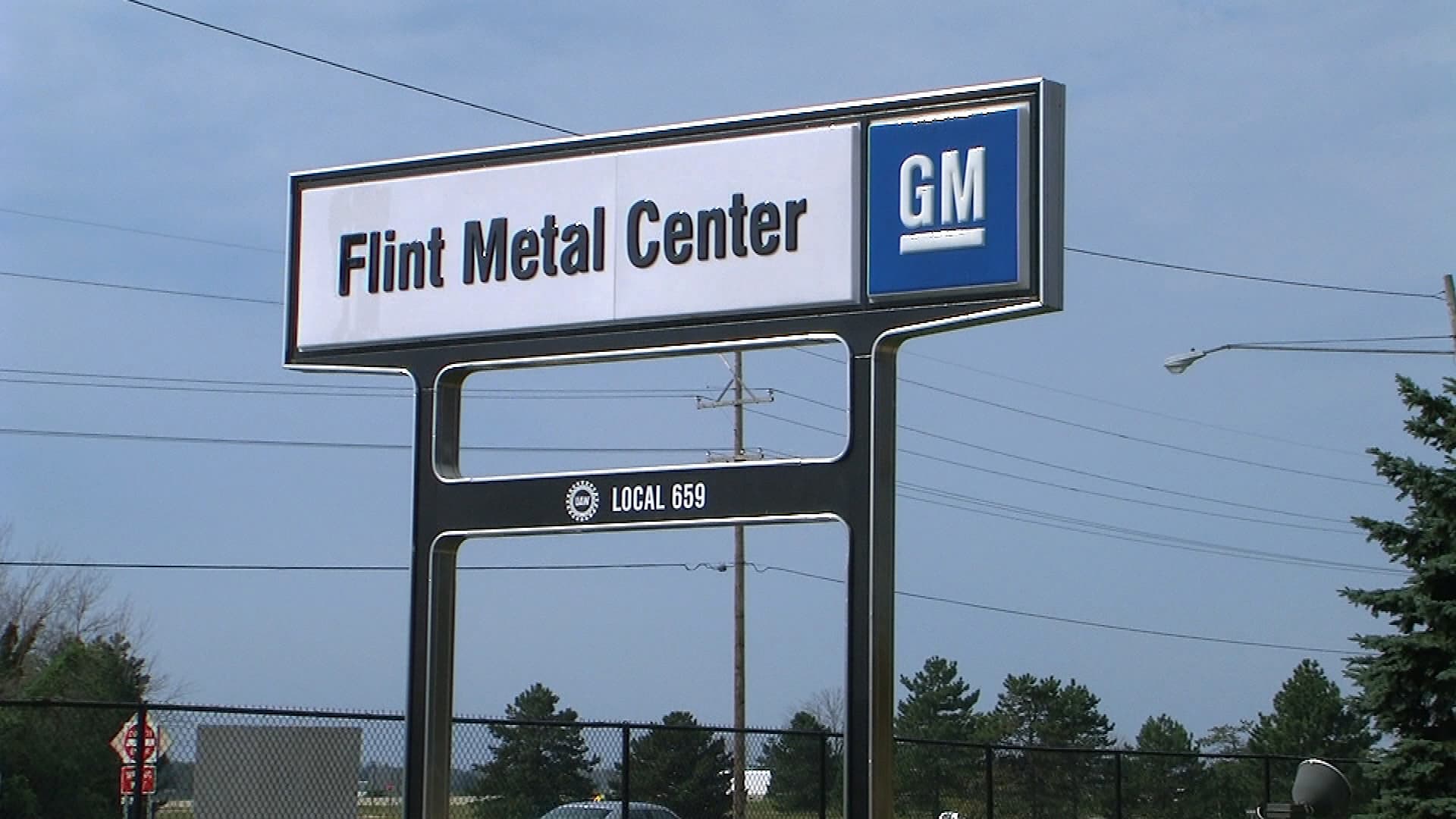GM Flint Metal Center sign
