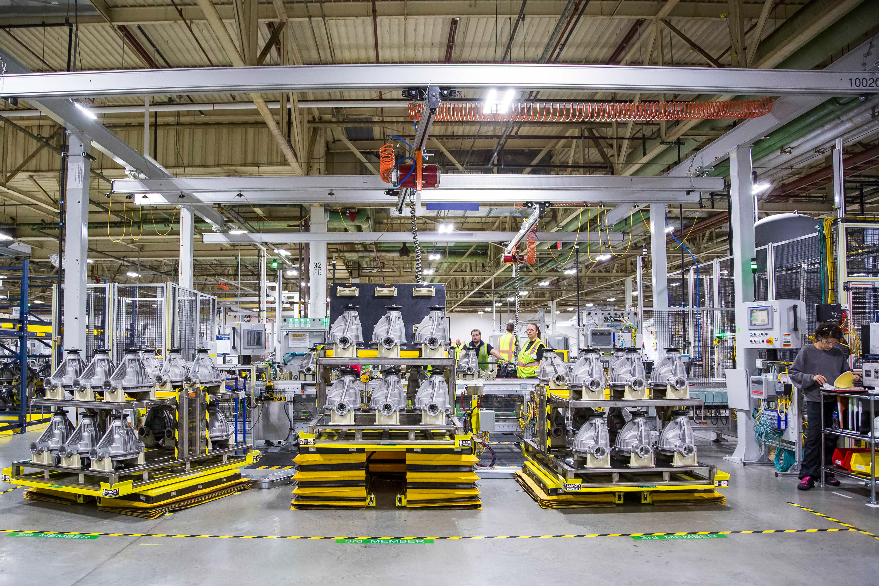 Pallets of axle parts sit on Grand Rapid Operations production facility floor