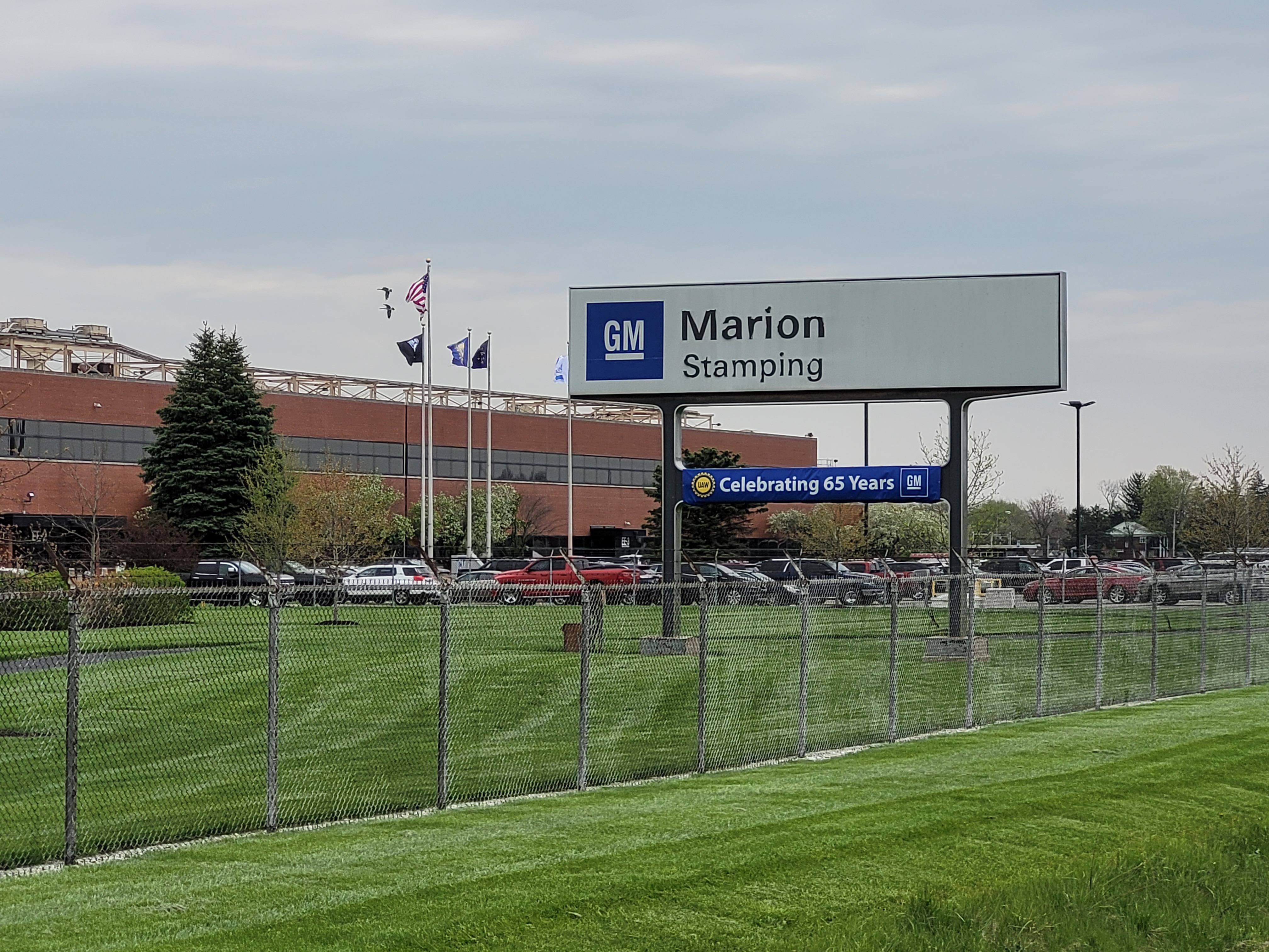 GM Marion Stamping Sign in front of plant