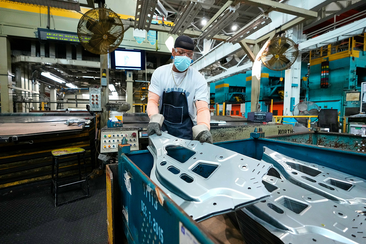 An employee at the General Motors Marion Metal Center works in the metal stamping operations.