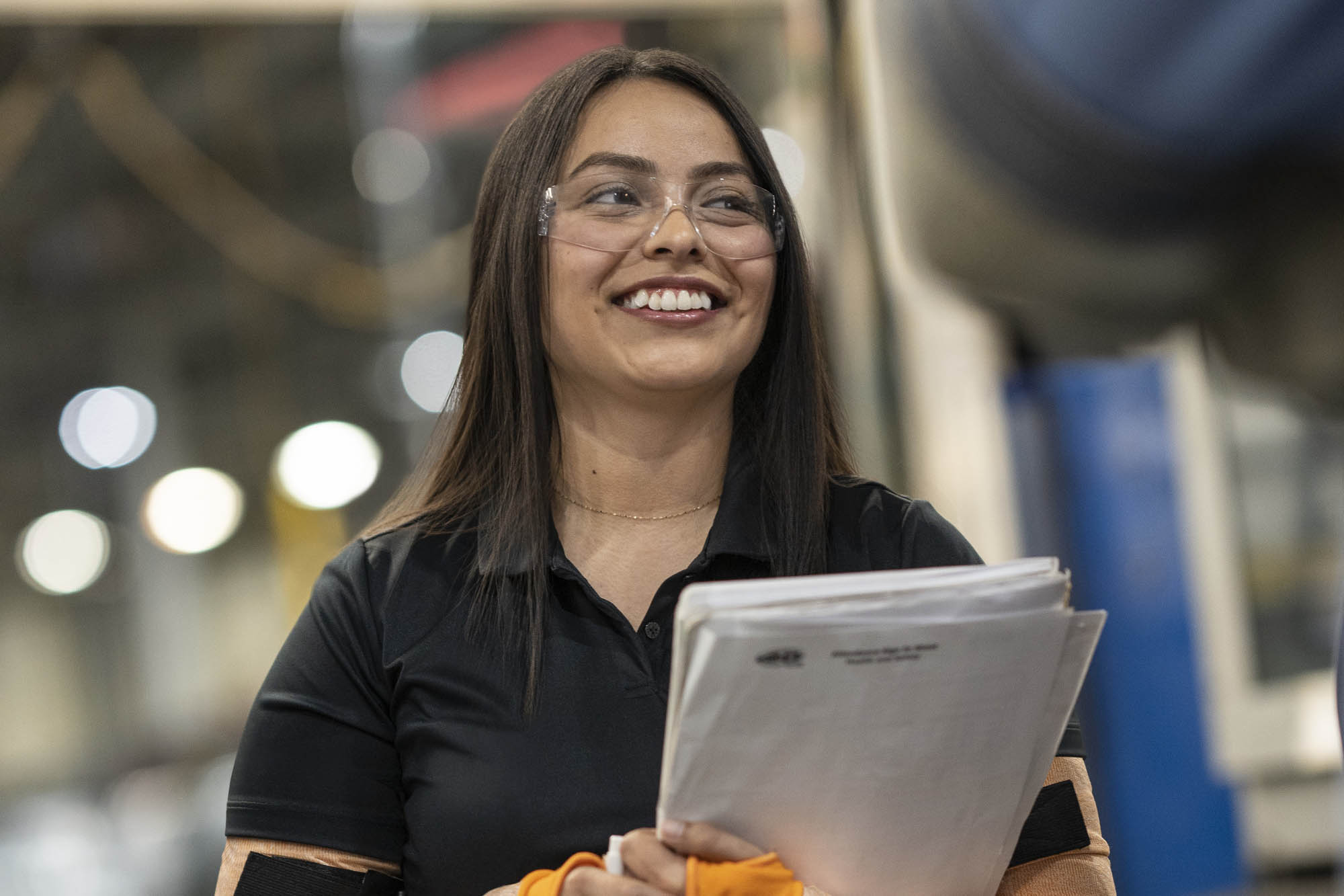 Dayana Villagran working at the Lansing Delta Township facility