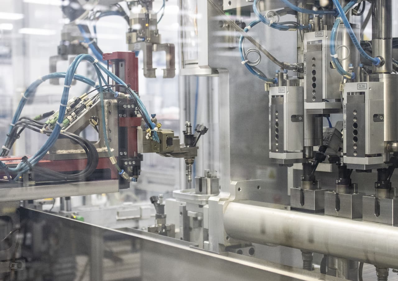 machine assembles and paints parts at Rochestor Operations