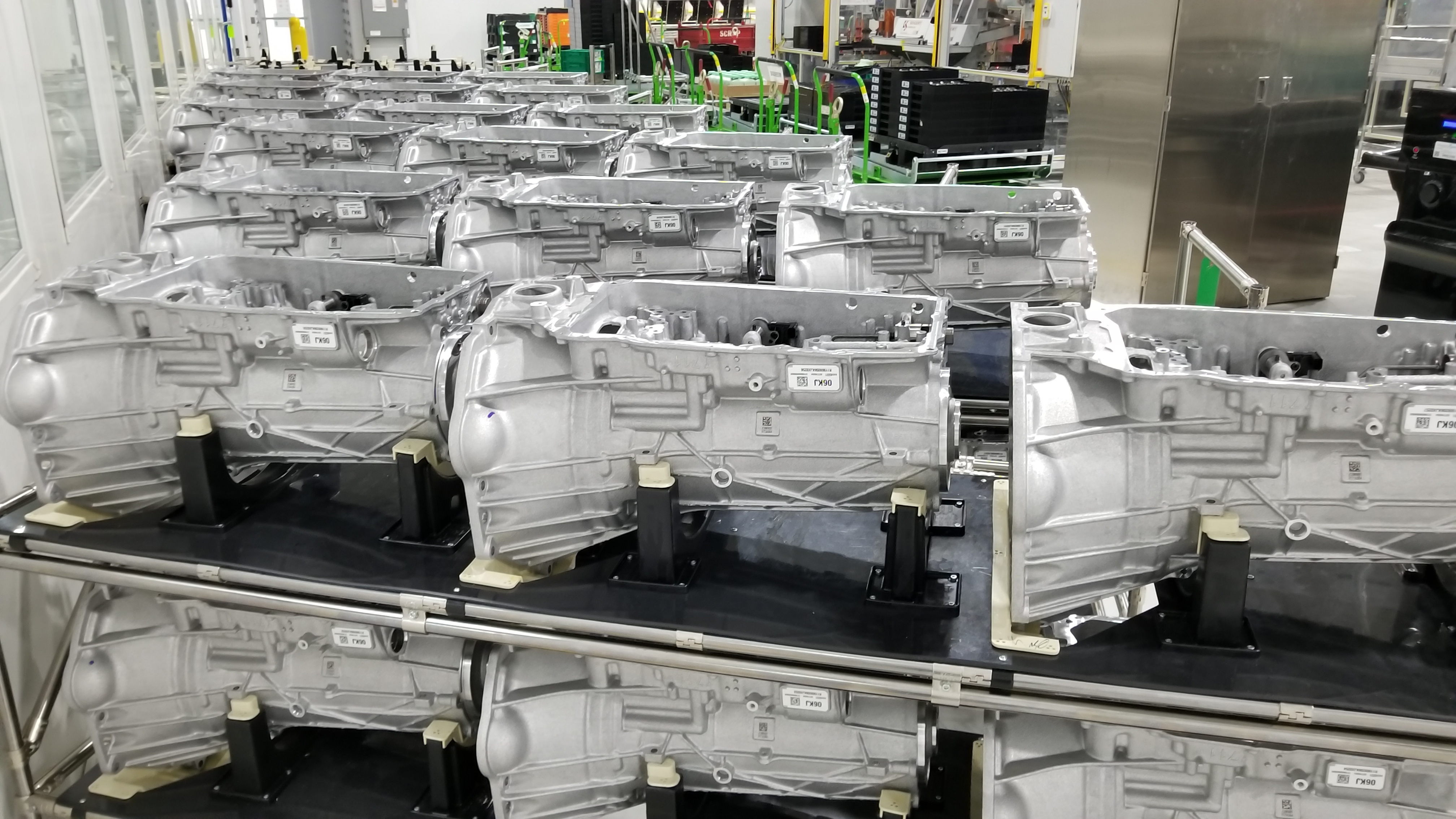 numerous transmission assemblies stacked on two levels