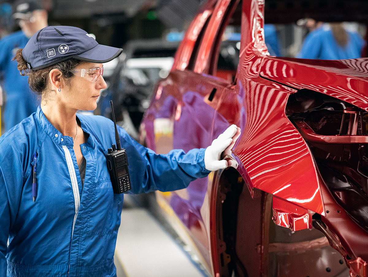An employee working in the paint shop at General Motors Spring Hill Manufacturing Complex.