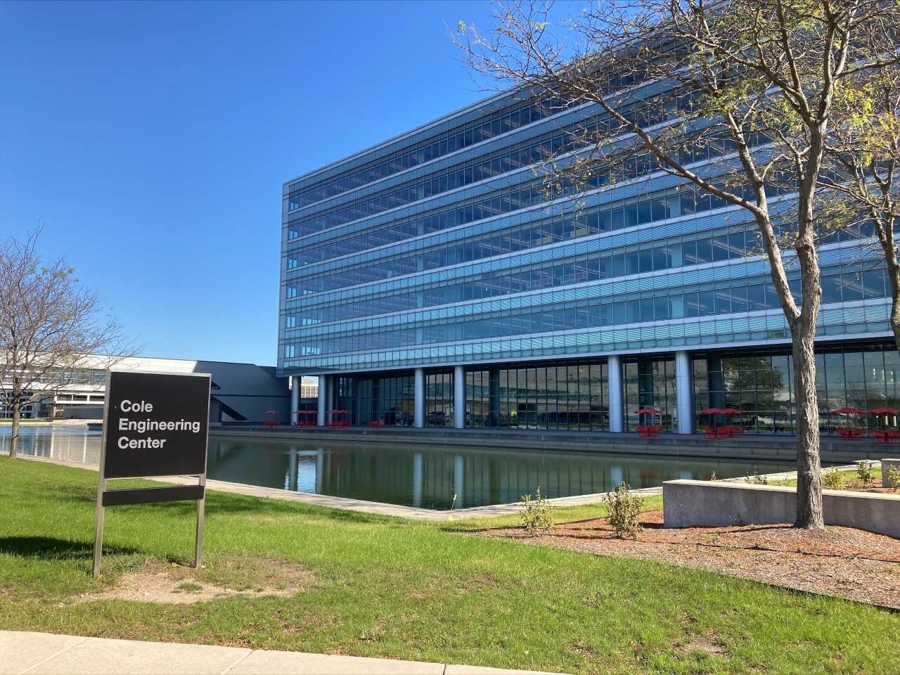 Exterior of Cole Engineering Center with reflecting pool in foreground