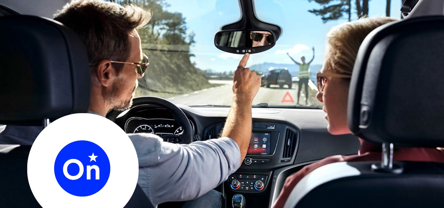 Driver Using OnStar & Connected Services in Vehicle