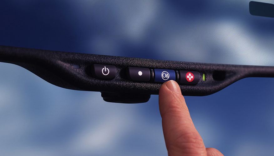 Driver Using The OnStar & Connected Safety Services in Vehicle