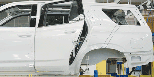 Close-up of a GM Vehicle’s Back Door Opened and Going Through Lab Testing