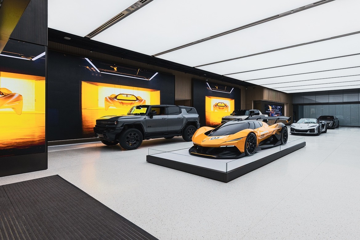 The Modern Interior of Entrance One Showcasing Multiple GM Vehicles Including a Cadillac Supercar and a GMC Hummer EV