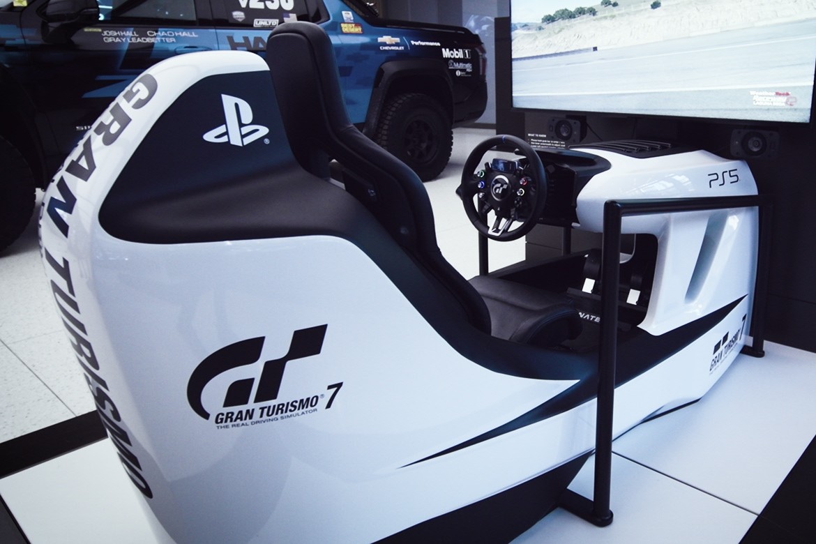 An Interior Shot of a Gran Turismo 7 PlayStation Racing Simulator at Entrance One