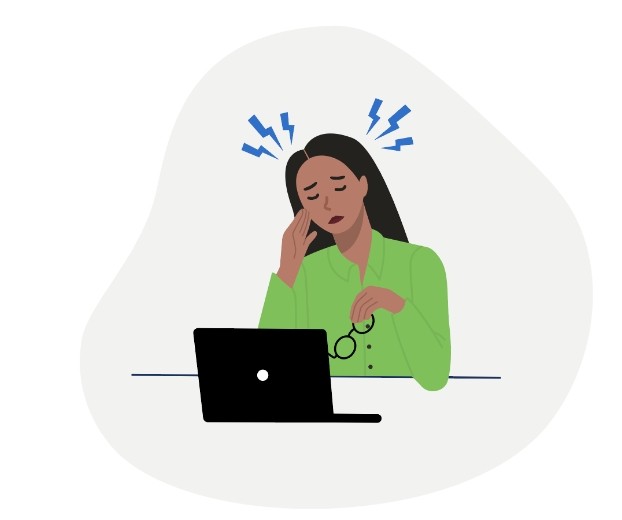 Woman in Green Shirt Stressed Out Near Her Laptop 