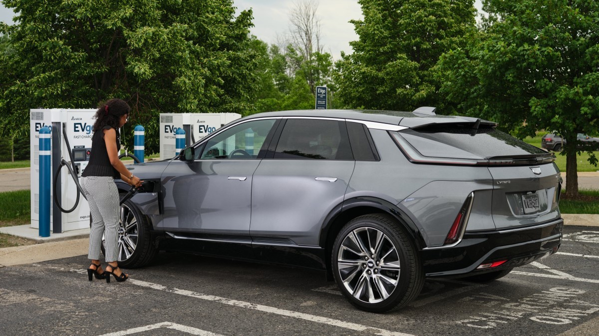 GM and Pilot Flying J build a coast-to-coast fast charging network Plugging in Charger to Electric Vehicle